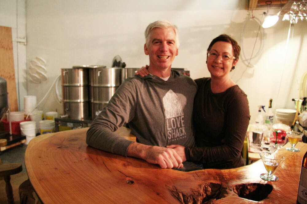 Dave and Rachel Paul in the tasting room/brewhouse at Love Shack Libations.