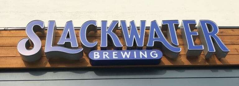 Outdoor signage at Slackwater Brewing