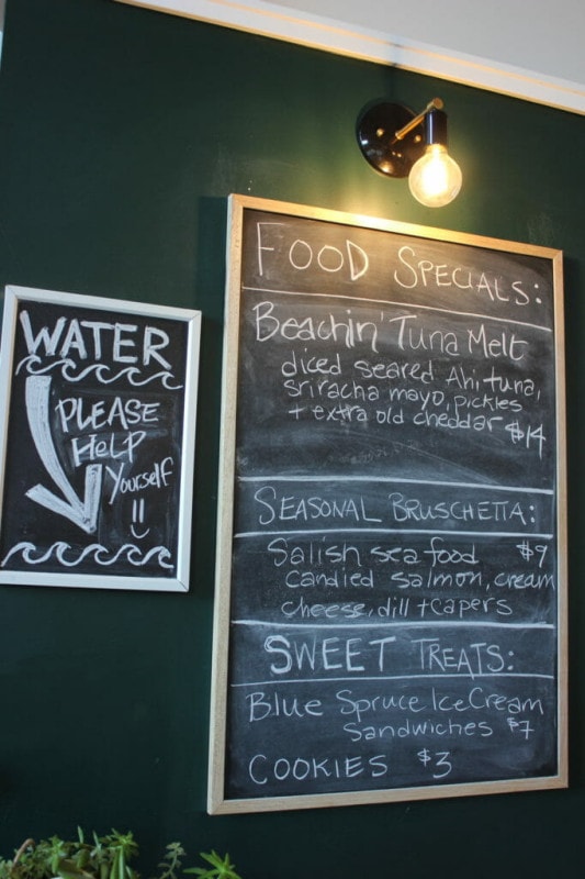 image of chalkboard sign featuring Land & Sea's food specials