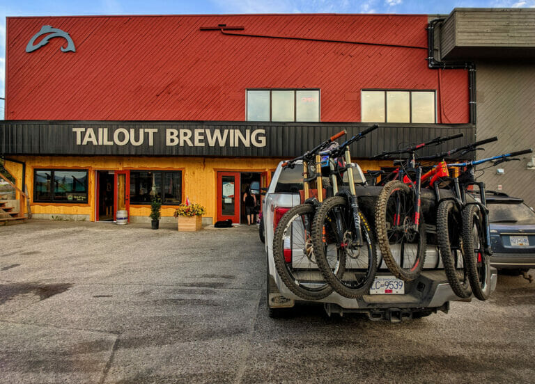Tailout Brewing parking lot with mountain bikes in truck
