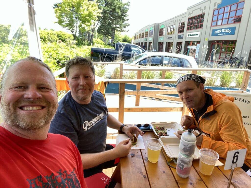 Cyclists at Four Winds Brewing - BC Ale Trail