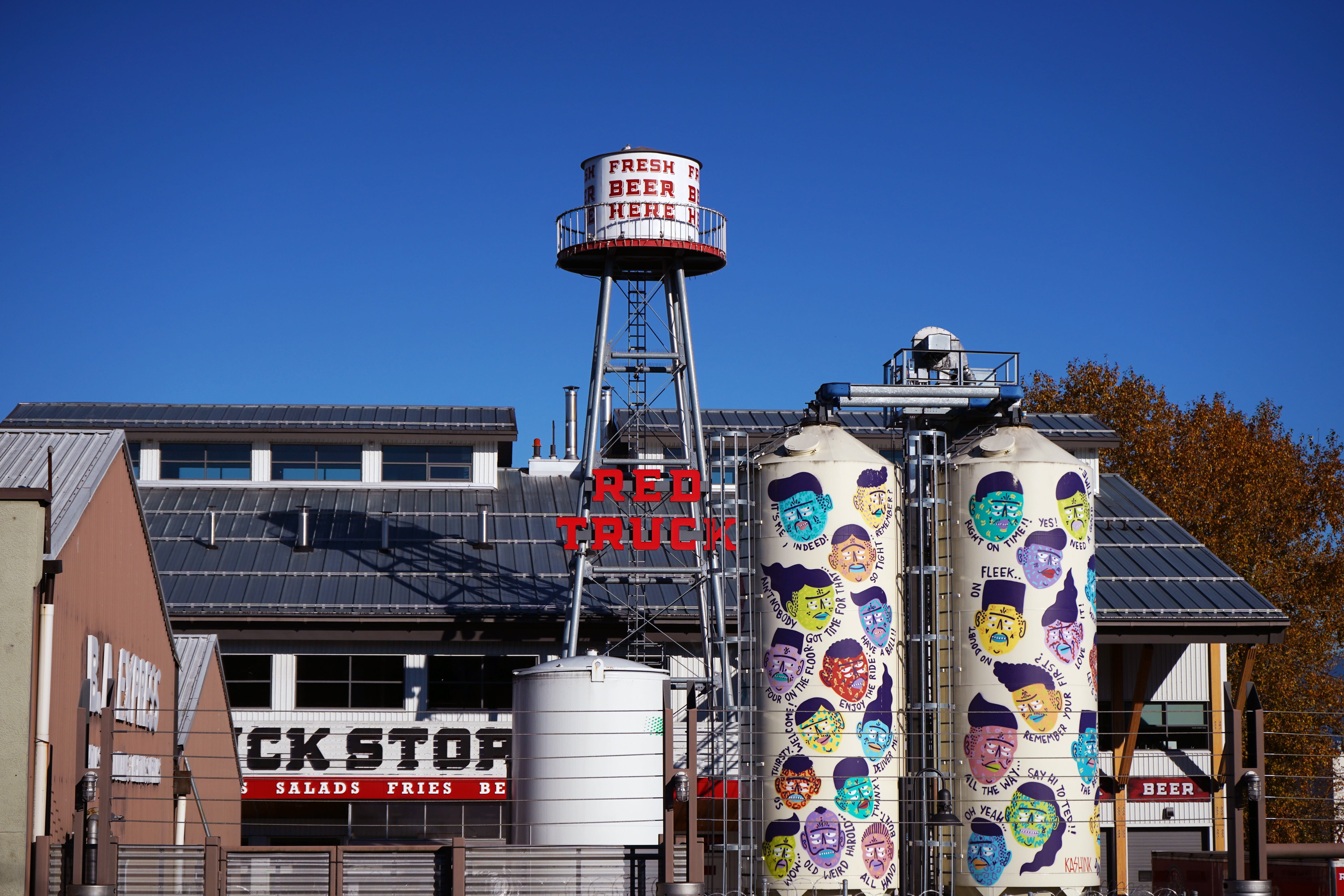 colourful tanks and a water tower at Red Truck Beer Company in Vancouver