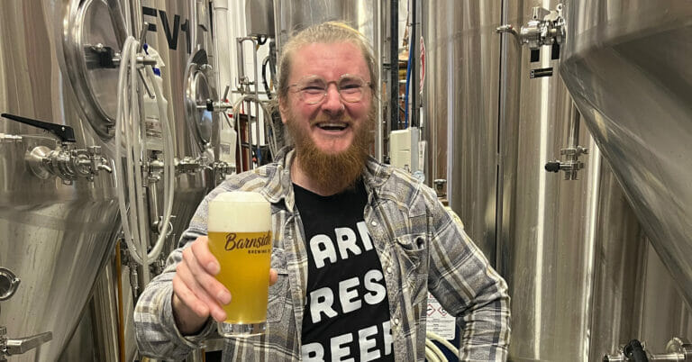 Justin Larter with an unclarified lager at Barnside Brewing
