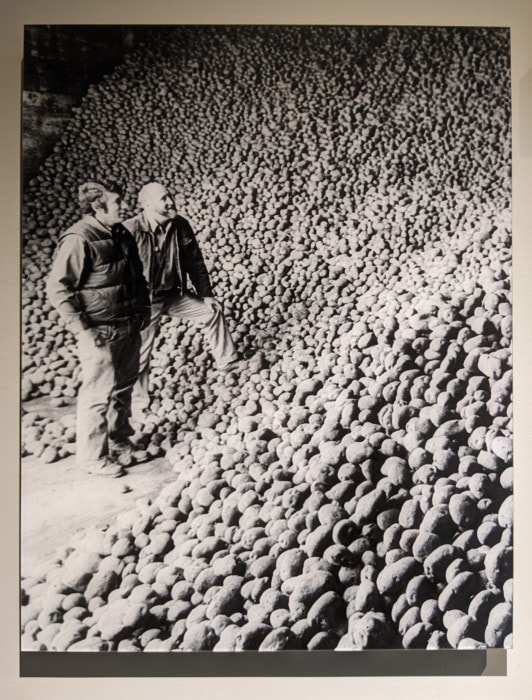 A black and white photo of Delta farmers with their potato crop from the walls of Barnside Brewing in Ladner, BC