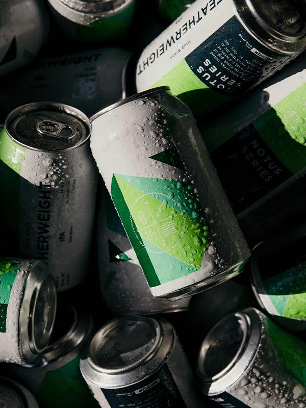 Cans of Featherweight IPA from Four Winds Brewing in Delta, BC