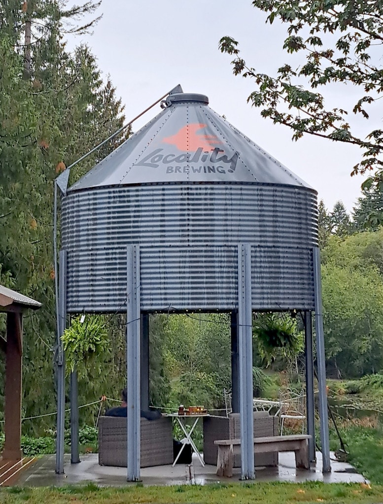 A repurposed grain silo provides covered seating at Locality Brewing in Langley, BC