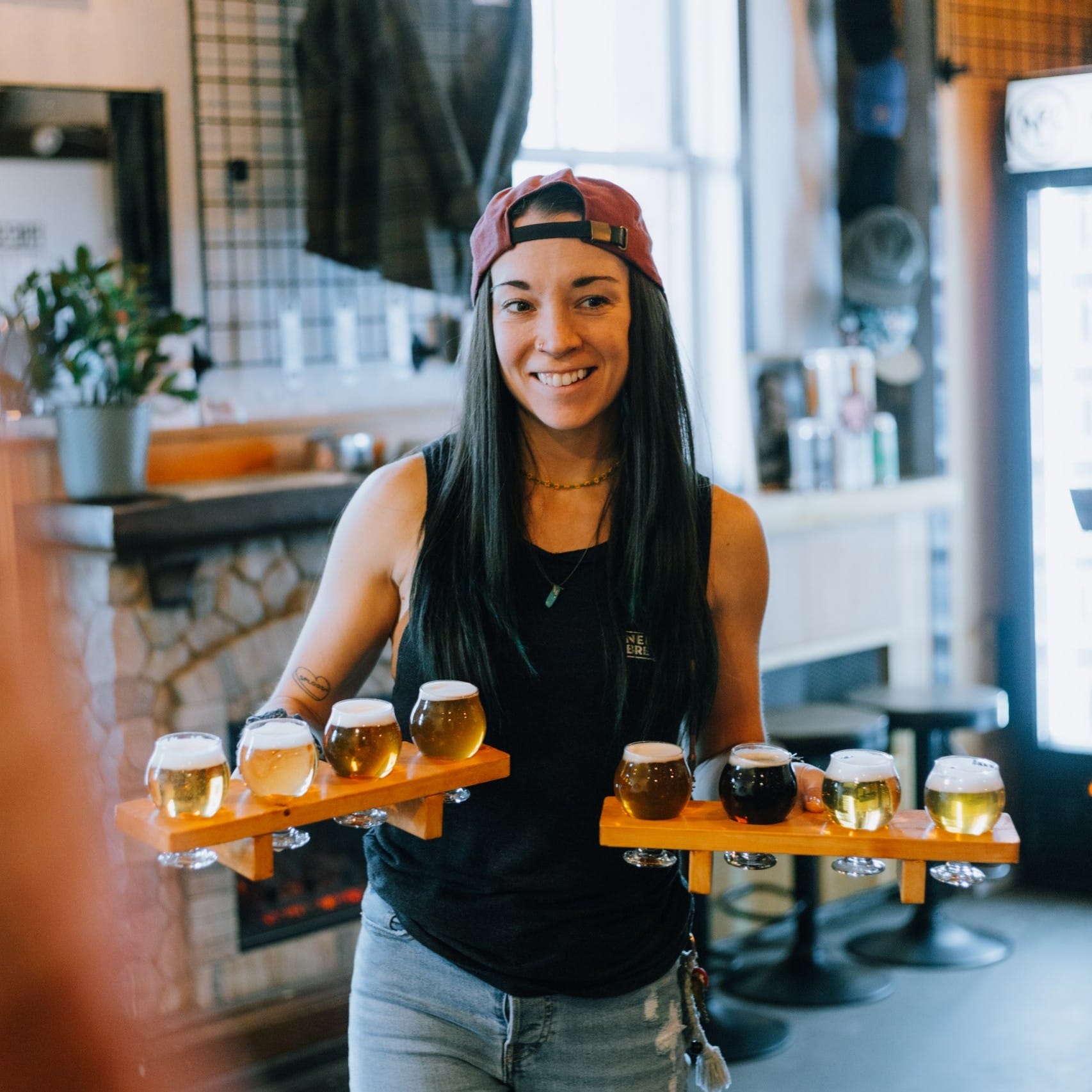 Serving up flights of craft beer at Nelson Brewing Co in Nelson, BC
