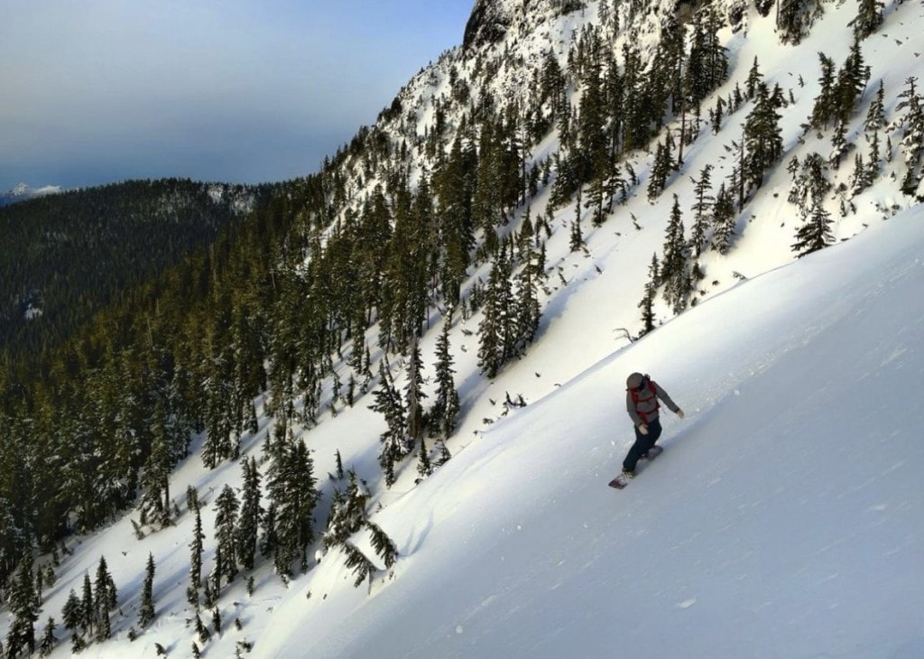Tessa Gabiniewicz from Land & Sea Brewing snowboarding at Mount Washington