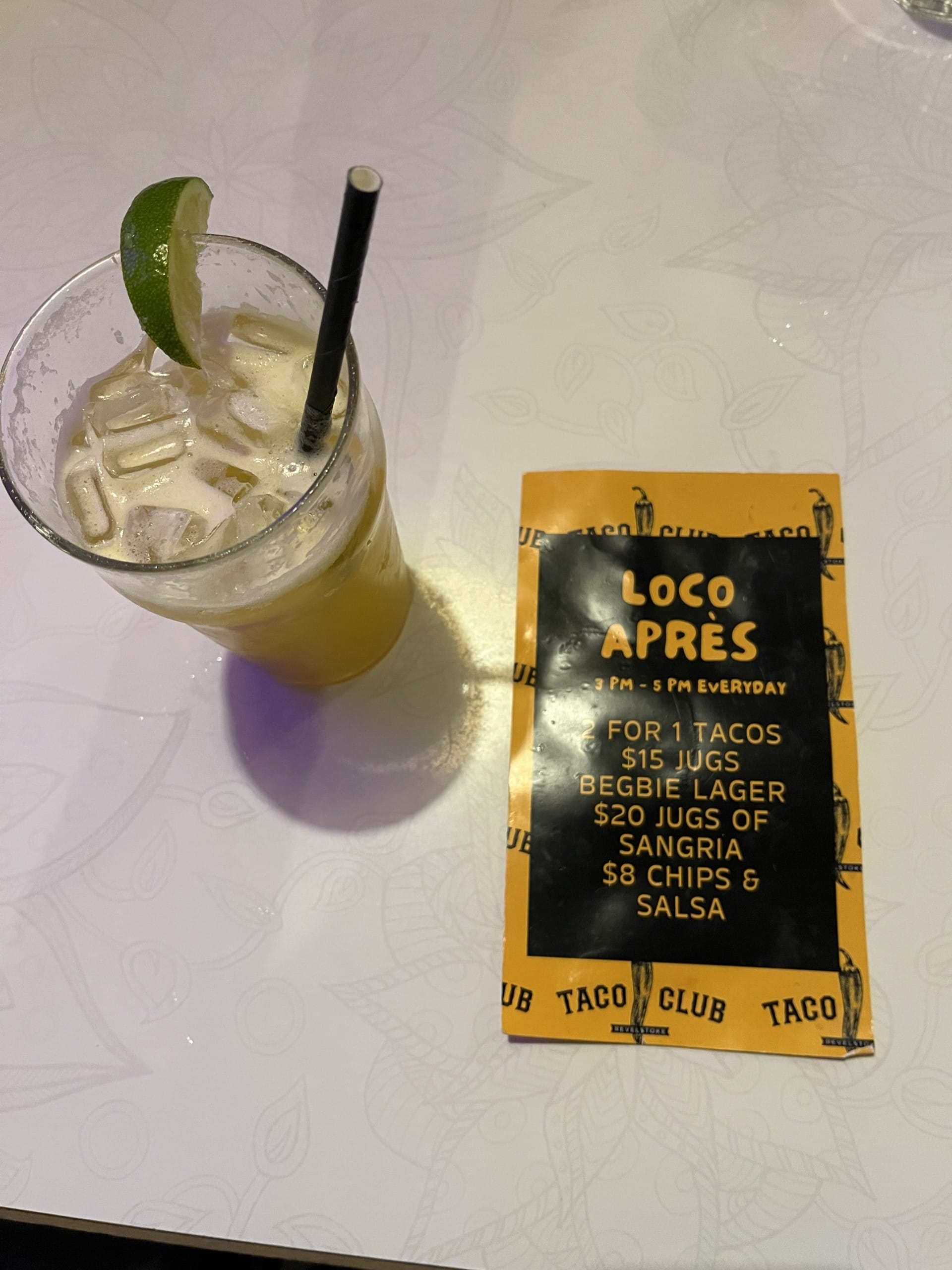 a drink and small menu at Taco Club in Revelstoke