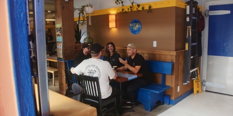 Matt, Colin, Nina, Isaiah in a meeting in the Whistle Buoy Taproom