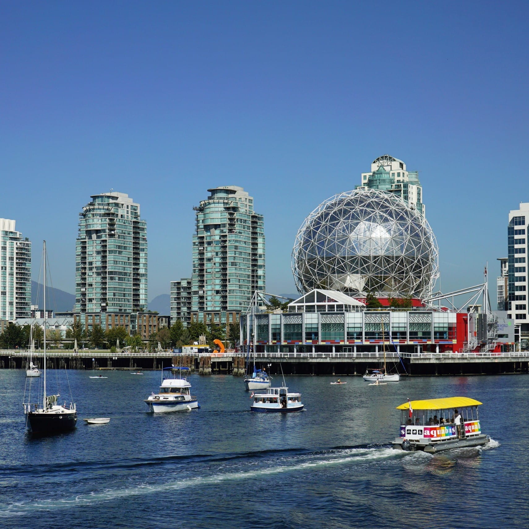The Aquabus at False Creek with Science World in the background in Vancouver