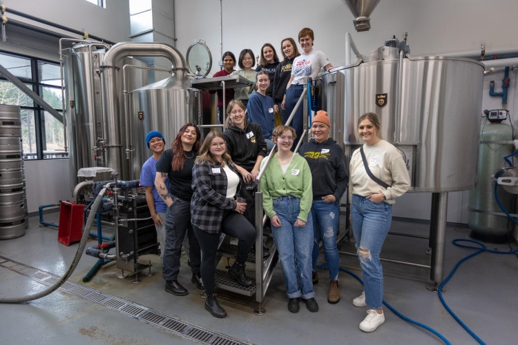 A group of women in the brewery at Sidekick Brewing in Chilliwack