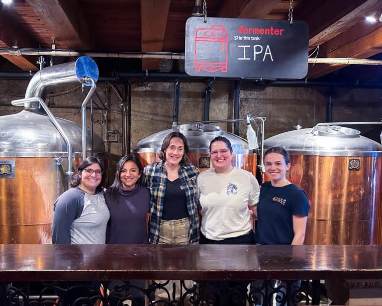 A group of women in the brewery at Steamworks Brew Pub in Vancouver