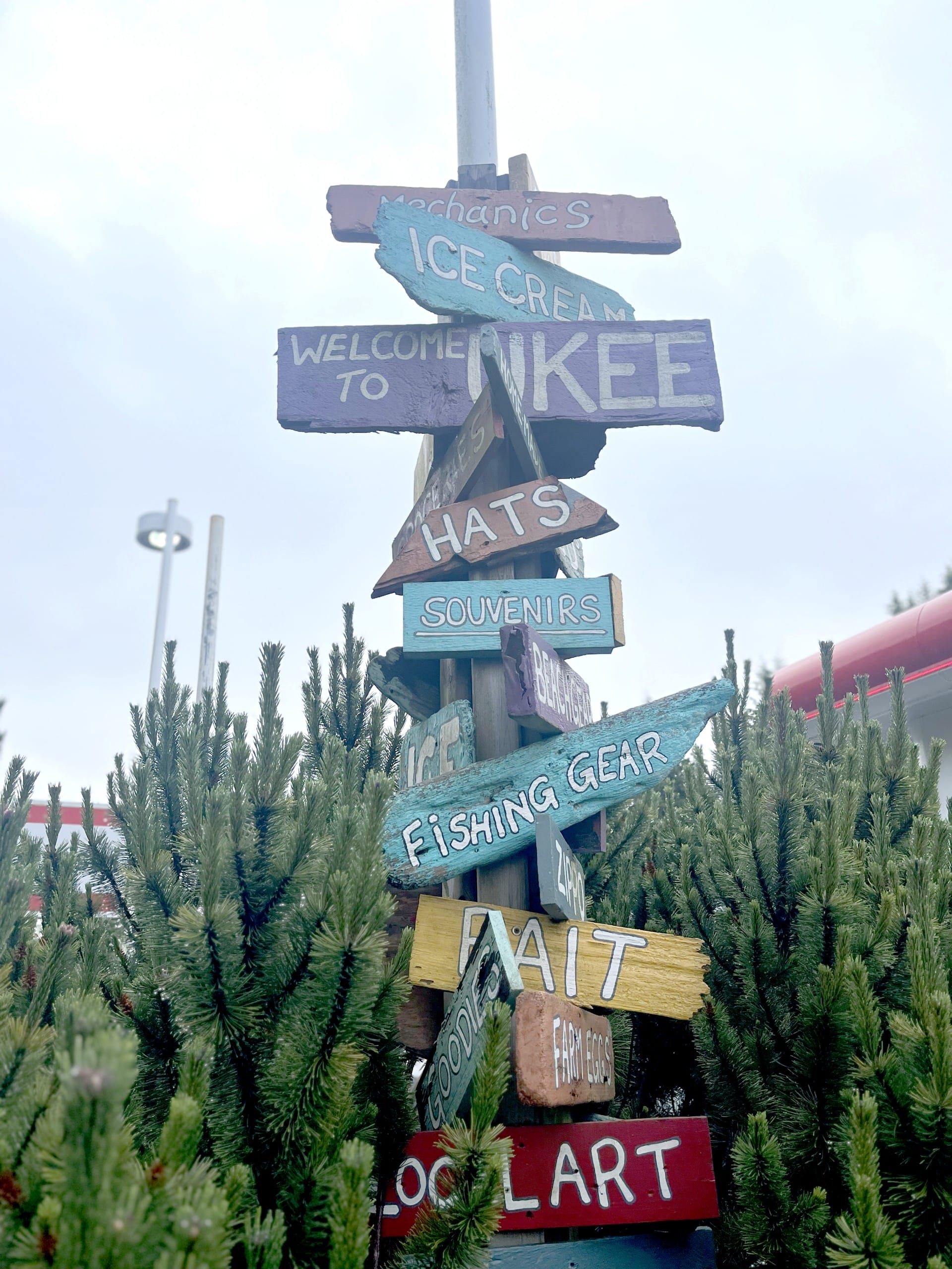 a colourful signpost in Ucluelet, BC