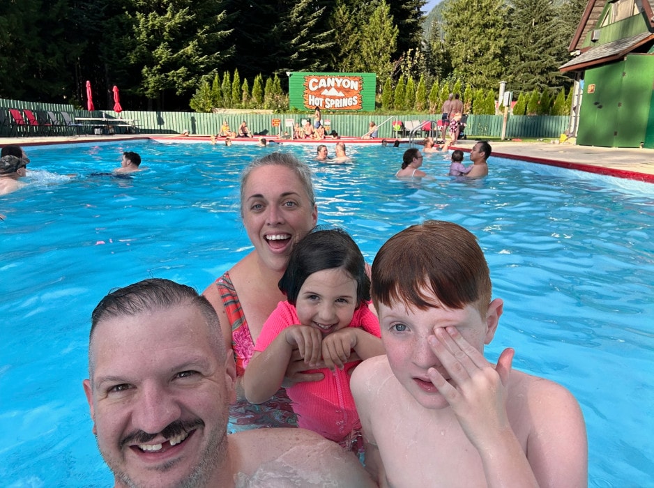 Rob Mangelsdorf and his family enjoying the hot spring pools at Canyon Hot Springs resort in the Canadian Kootenay Rockies