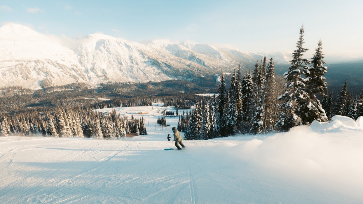 wide views of a skiier at Powder King Mountain Resort in Prince George, BC