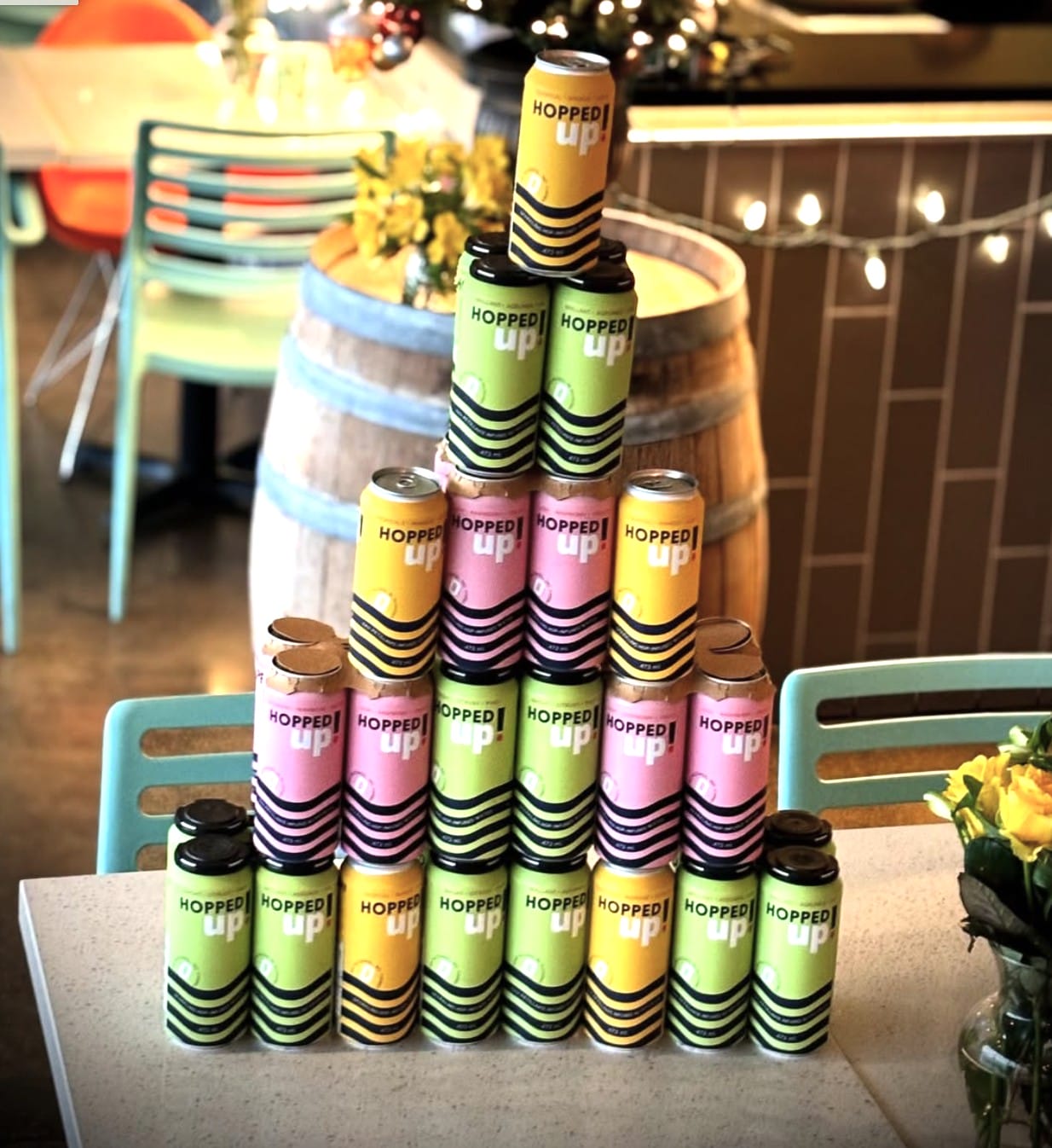 a large tower of cans of Hopped Up! made by Category 12 Brewing in Victoria, BC (photo provided)