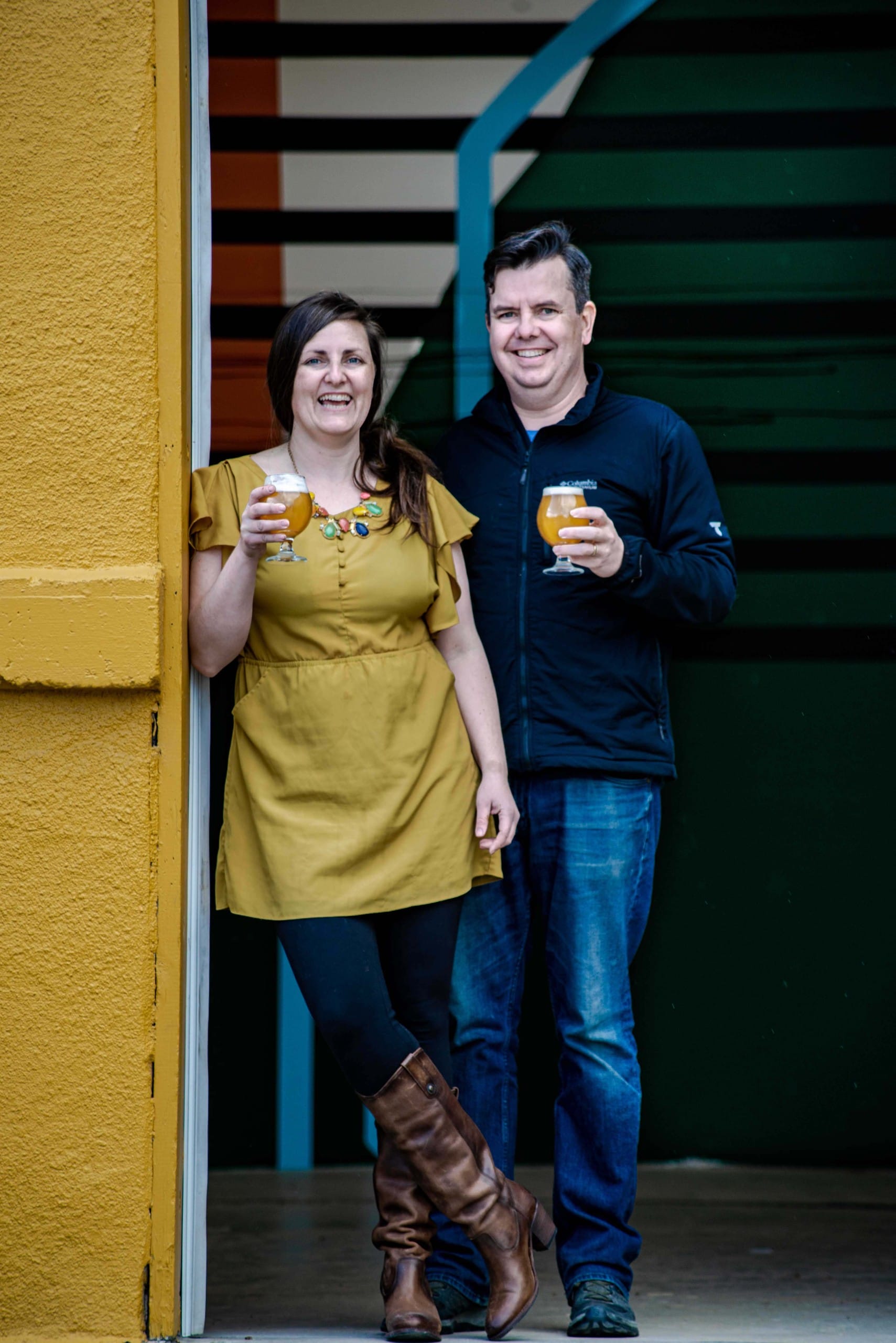 Tin Whistle Brewing Co owners Alexis Esseltine and Tim Scoon pose together at the brewery