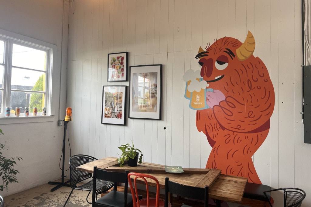 Murals and artwork decorate the tasting room at Tin Whistle Brewing in Penticton, BC