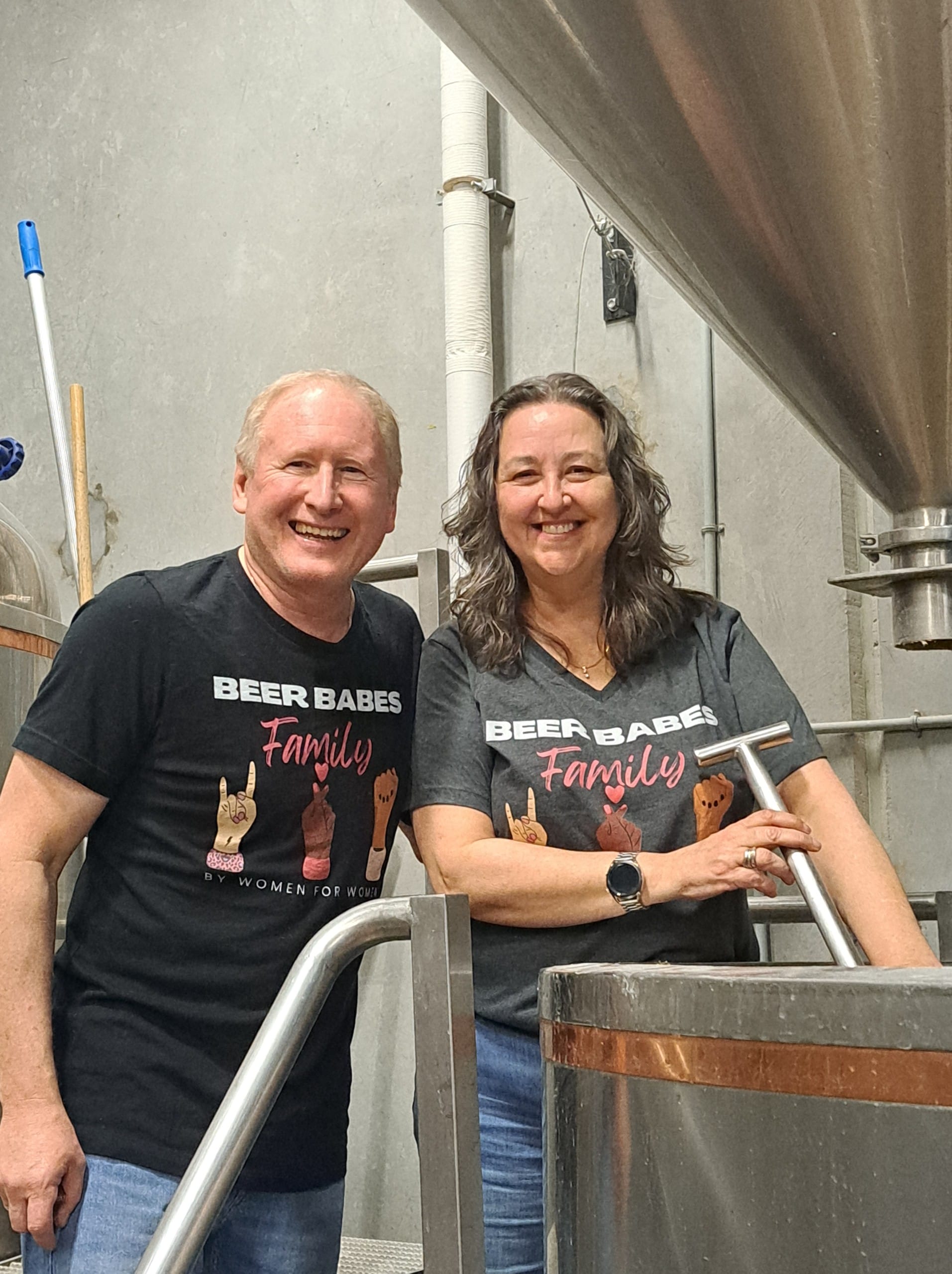 Colleen and Phil Bond take their turns stirring the mash