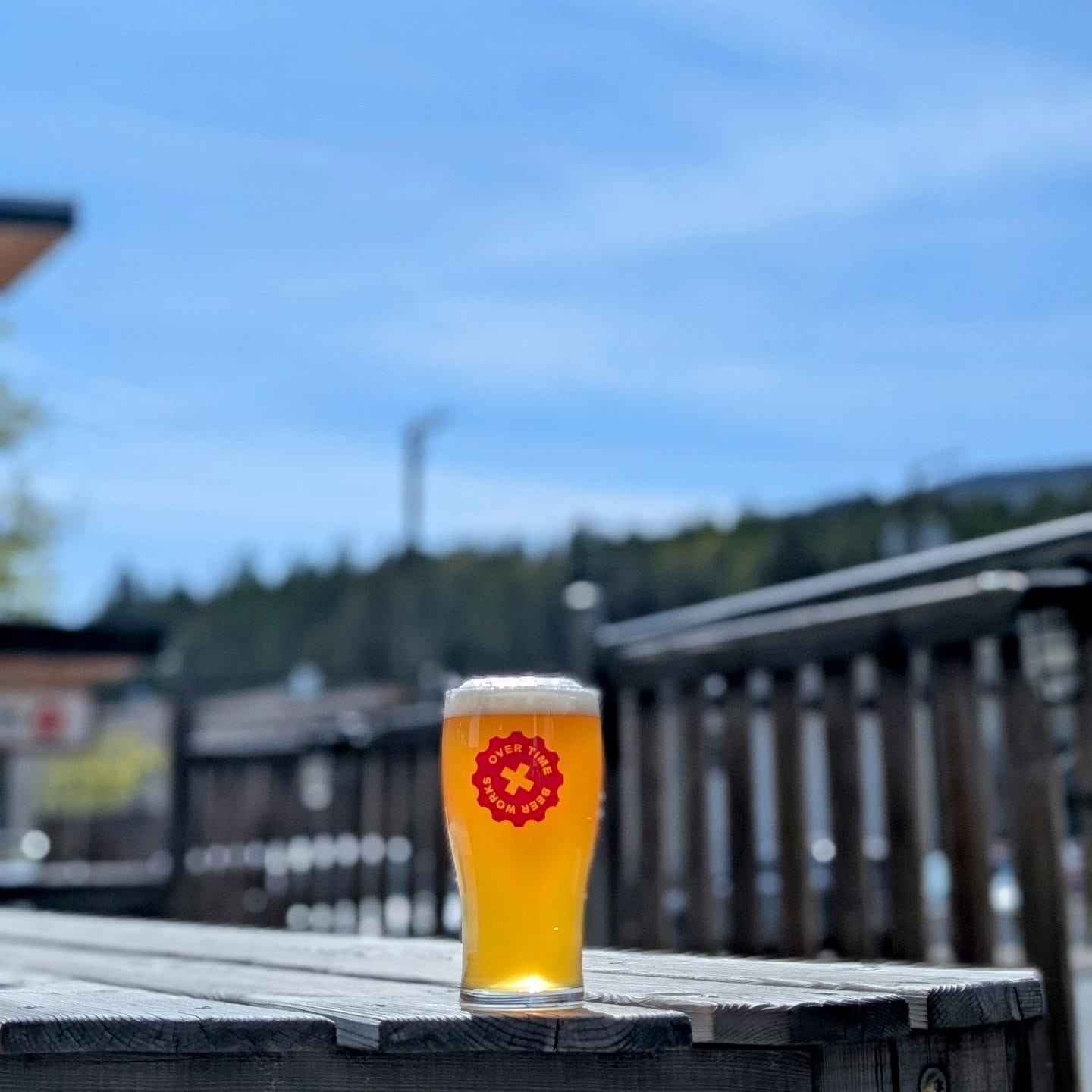 a pint of craft beer on the sunny patio at Over Time Beer Works in Kimberley, BC