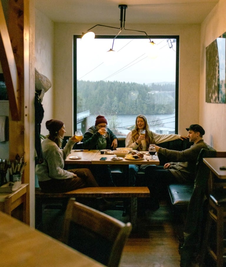 A cozy spot for friends and laughter at Ucluelet Brewing Company in Ucluelet, BC