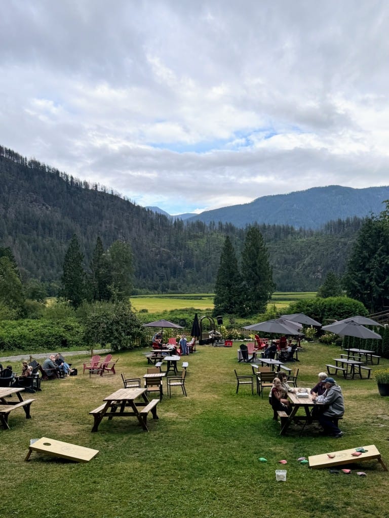 the outdoor seating areas with mountain views at Homestead Cider in Agassiz, BC (photo: Matt Wastradowski)
