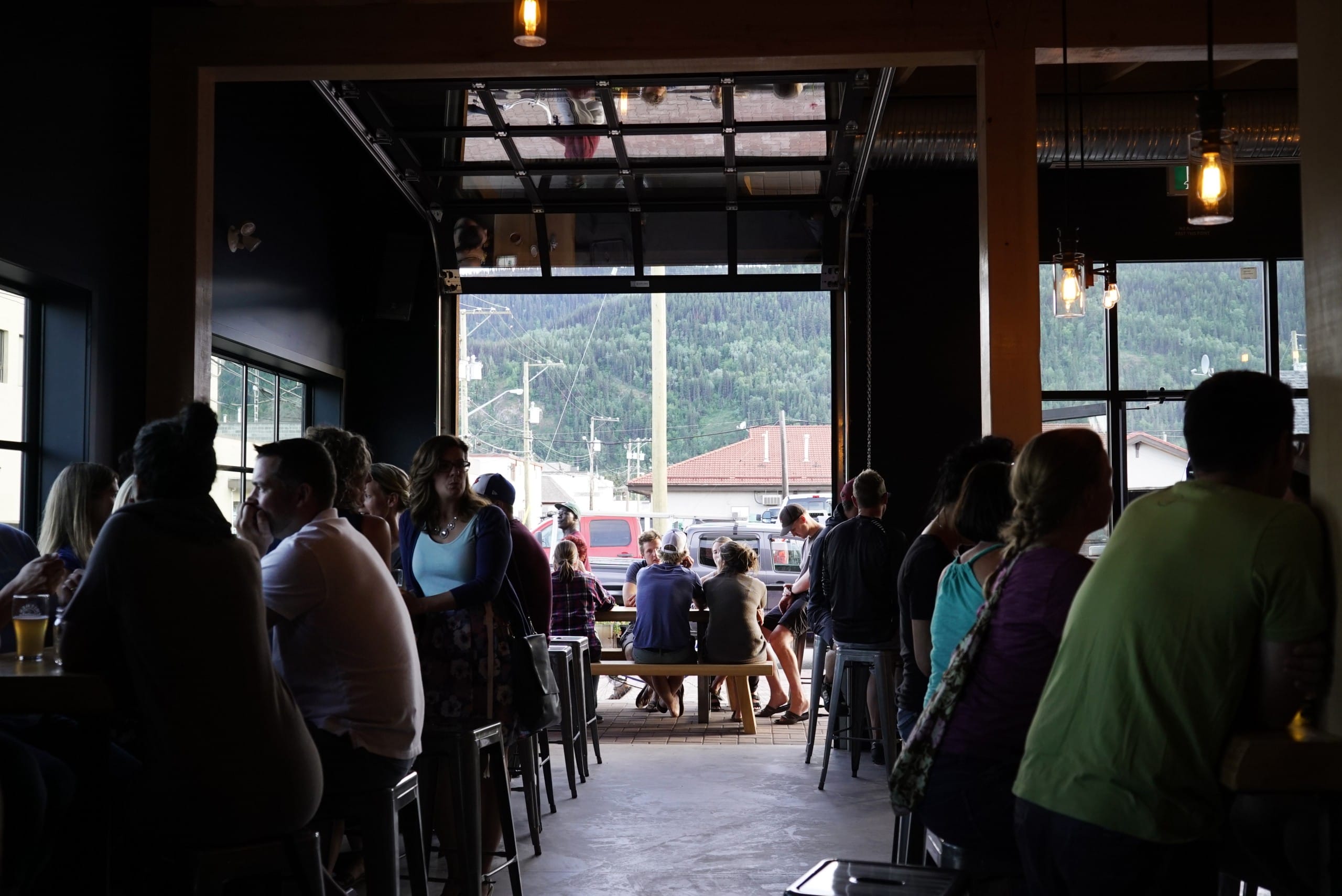 the taproom, open to the patio, at Smithers Brewing Company in Smithers, BC