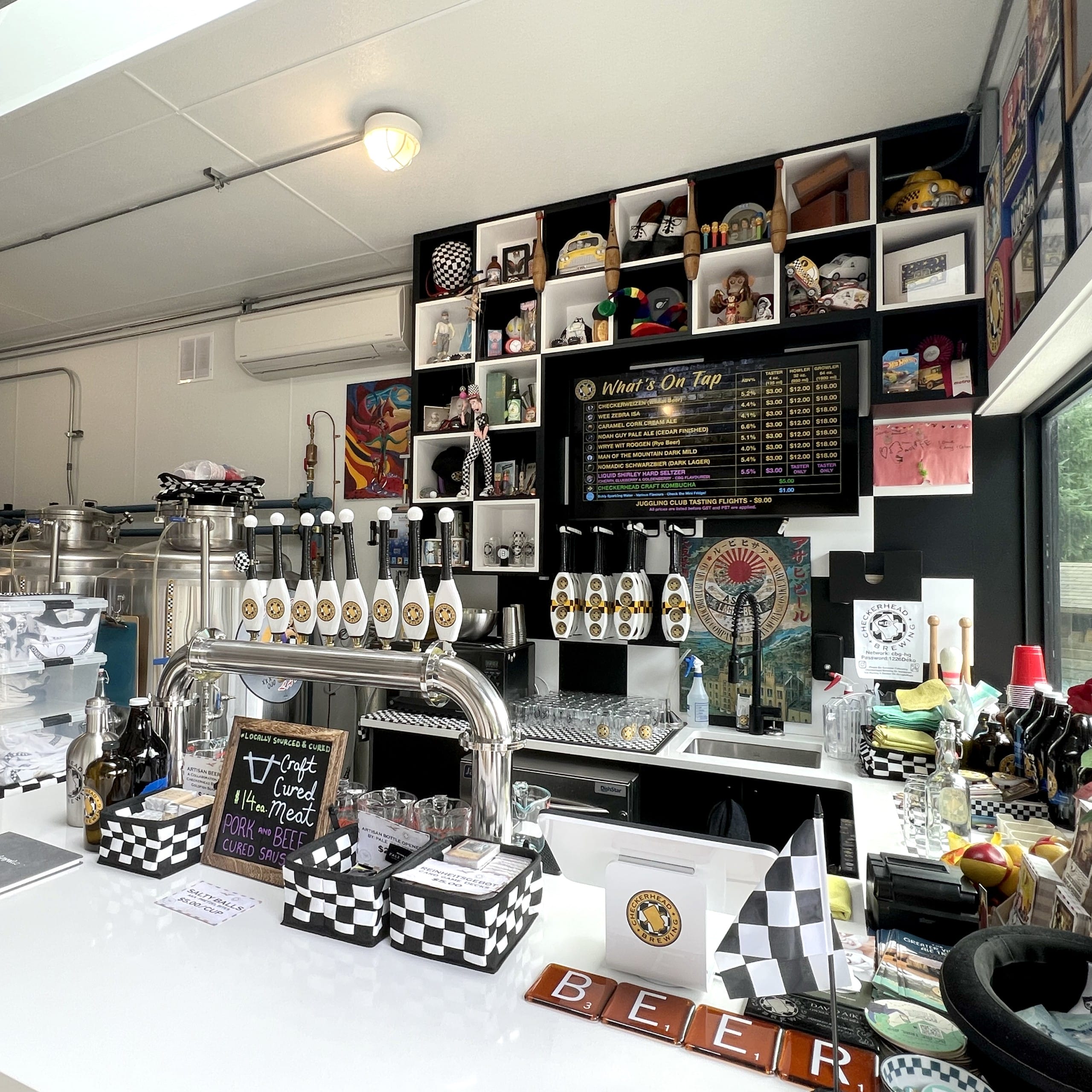 the taproom at Dave, owner and brewer, serves up a flight at Checkerhead Brewing in Shirley, BC (photo: Victoria Taste Buds)