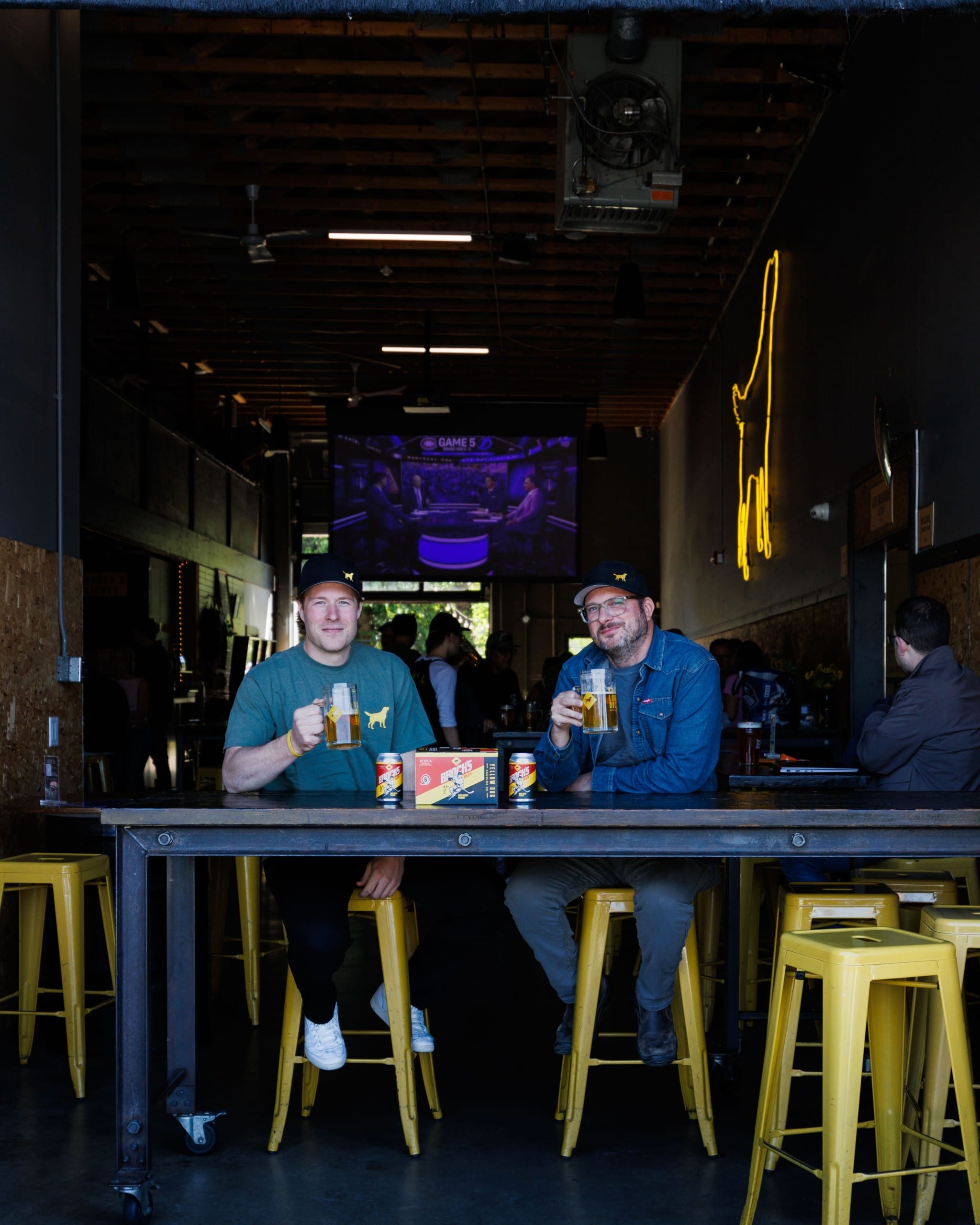 Brock Boeser (left) with Brock's Beer West Coast Pilsner from Yellow Dog Brewing in Penticton and Port Moody, BC (photo provided)